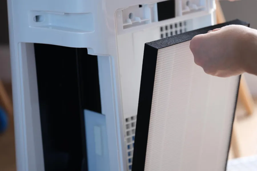 Removing a HEPA filter from a standalone air purifier for replacement